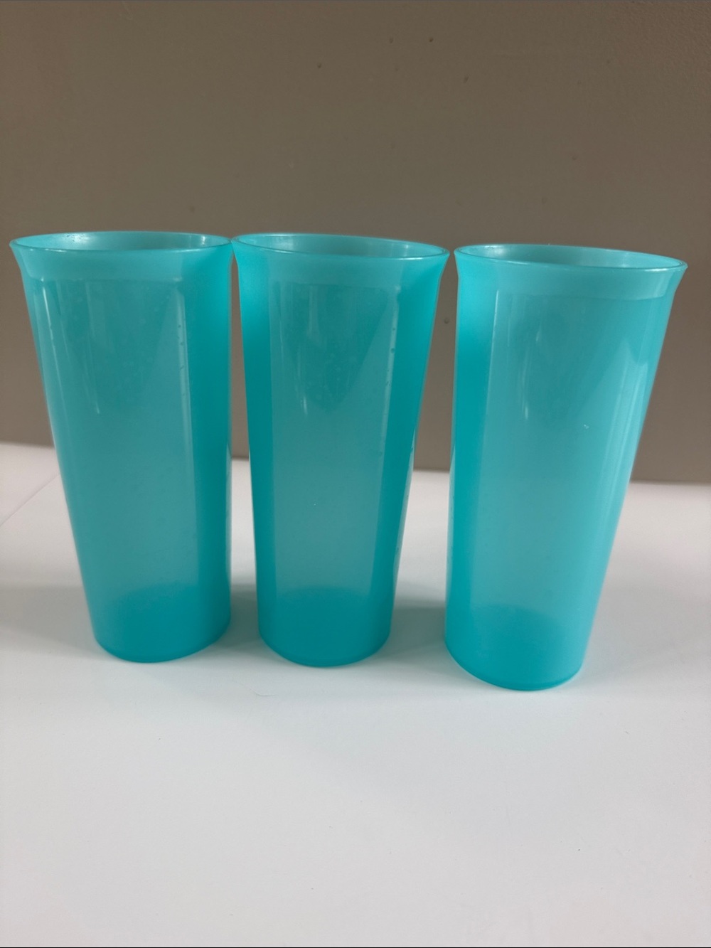 Set of Three Tall Turquoise Plastic Tumblers
